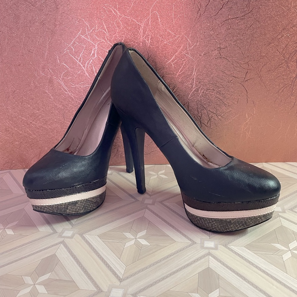 Black with snake skin and cream accent Qupid sky high platform heels